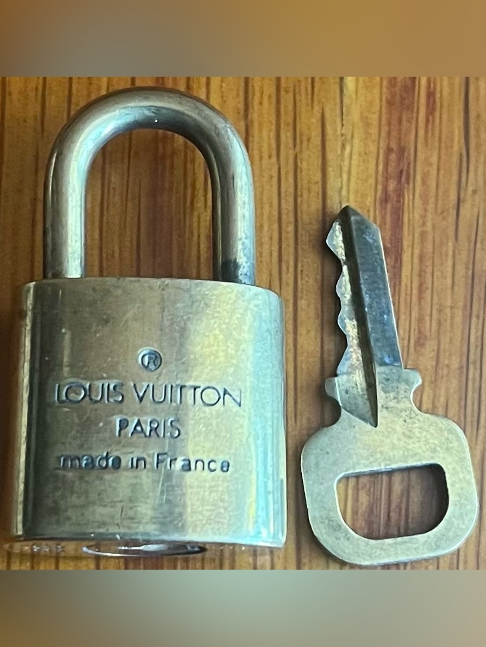 Louis Vuitton padlock and key